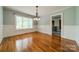 Hardwood floors, natural light, and fresh paint enhance the dining room's classic charm at 2646 Jacobs Rd, Gastonia, NC 28054