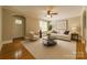 Inviting living room with hardwood floors, neutral decor, and ample natural light at 2646 Jacobs Rd, Gastonia, NC 28054