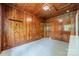 Wood-paneled room featuring a hat rack and two closets at 2646 Jacobs Rd, Gastonia, NC 28054