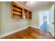 Cozy room with hardwood floors, built in shelving, and natural lighting at 2646 Jacobs Rd, Gastonia, NC 28054