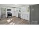 Renovated kitchen with new white cabinets, countertops, appliances, and fixtures at 2679 Providence Mill Rd, Maiden, NC 28650