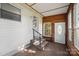 Cozy sunroom with wood paneled walls and windows offering natural light at 2679 Providence Mill Rd, Maiden, NC 28650