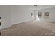 Spacious bonus room with carpet flooring, bright lighting, and natural light at 277 Supernova Dr, York, SC 29745