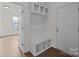 Entryway with coat rack, bench, storage, and access to additional rooms at 277 Supernova Dr, York, SC 29745