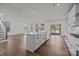 A spacious kitchen island with stainless steel appliances and plenty of room for entertaining at 277 Supernova Dr, York, SC 29745