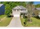 Beautiful two-story home boasts a manicured lawn, two-car garage, and a welcoming front porch at 3040 Sunshower Hts, York, SC 29745