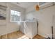 Functional laundry area with washer, dryer, and shelving for storage at 3040 Sunshower Hts, York, SC 29745