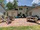 Spacious brick patio ideal for outdoor gatherings, with a grill and ample seating at 3324 Champaign St, Charlotte, NC 28210