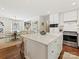 Open concept kitchen with a large island, stainless steel appliances, and easy access to the dining area at 3324 Champaign St, Charlotte, NC 28210