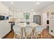 Bright and modern kitchen featuring an island, stainless appliances, and white cabinets at 3324 Champaign St, Charlotte, NC 28210
