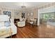 Inviting living room featuring a fireplace, custom built-ins, and sophisticated decor at 3324 Champaign St, Charlotte, NC 28210