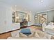 Open office with ample storage and stylish decor at 3324 Champaign St, Charlotte, NC 28210