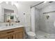 Charming bathroom featuring marble-look tiled shower at 3423 Archer Ave, Charlotte, NC 28217