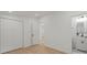 Bright bedroom with wood-look floors, closet and ensuite bathroom at 3423 Archer Ave, Charlotte, NC 28217