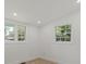 Bright and airy bedroom featuring hardwood floors, fresh white walls and natural light at 3423 Archer Ave, Charlotte, NC 28217