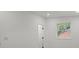 Light bedroom featuring hardwood floor and a window at 3423 Archer Ave, Charlotte, NC 28217