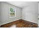 Bedroom with a window and hardwood floors at 3725 Dunwoody Dr, Charlotte, NC 28215