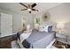 Bright bedroom featuring a ceiling fan, decor and natural light from the windows at 3725 Dunwoody Dr, Charlotte, NC 28215