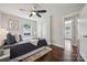 Cozy bedroom with a ceiling fan and natural light, featuring hardwood floors at 3725 Dunwoody Dr, Charlotte, NC 28215
