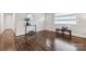 Bright entryway features hardwood floors, natural light and a stylish console table with decorative accents at 3725 Dunwoody Dr, Charlotte, NC 28215
