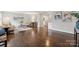 Inviting living room featuring hardwood floors, stylish furniture, and a barn door leading to the kitchen at 3725 Dunwoody Dr, Charlotte, NC 28215