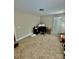 Cozy bedroom featuring neutral walls, carpet floors, and an office space, perfect for relaxation and productivity at 4476 River Rd, Stanfield, NC 28163