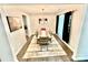 Elegant dining room with large table, area rug, and natural light at 4476 River Rd, Stanfield, NC 28163