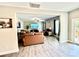 Cozy living room with hardwood floors, a ceiling fan and ample seating at 4476 River Rd, Stanfield, NC 28163