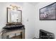 Bathroom with sleek black sink, a modern mirror and neutral wall art at 58 Ridgeport Rd, Clover, SC 29710