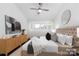 Bright bedroom with modern decor, a ceiling fan and large bed at 58 Ridgeport Rd, Clover, SC 29710