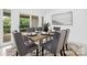 Dining room with table set for eight, sliding door to exterior patio at 58 Ridgeport Rd, Clover, SC 29710