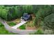 Gorgeous aerial shot of the well-manicured yard and winding driveway leading to a stunning home at 6265 Riviera Run Estates Dr, Hickory, NC 28601