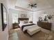 Bedroom featuring hardwood floors, natural light, and modern furnishings at 6265 Riviera Run Estates Dr, Hickory, NC 28601