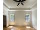 Spacious bedroom featuring hardwood floors, natural light, and a ceiling fan at 6265 Riviera Run Estates Dr, Hickory, NC 28601