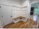 Entryway with wood bench and coat hooks at 6265 Riviera Run Estates Dr, Hickory, NC 28601
