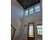 Elegant entryway features high ceilings, a modern chandelier, and a light-filled glass front door at 6265 Riviera Run Estates Dr, Hickory, NC 28601