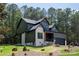 Beautiful two-story home with a mix of brick and siding, complemented by a well-manicured lawn and landscape at 6265 Riviera Run Estates Dr, Hickory, NC 28601