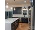 Stylish kitchen featuring a spacious island, modern lighting, stainless steel appliances, and plenty of storage at 6265 Riviera Run Estates Dr, Hickory, NC 28601