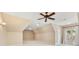 Upstairs bedroom showcasing ample natural light and featuring carpet, dormer, and door to ensuite at 703 Sainte Rose Ln, Charlotte, NC 28226