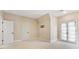 Neutral bedroom with double French doors and ample natural light with adjacent closet and ensuite at 703 Sainte Rose Ln, Charlotte, NC 28226