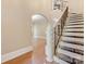 Detailed staircase with hardwood and carpeting leading to upper level at 703 Sainte Rose Ln, Charlotte, NC 28226