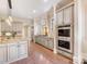 A gourmet kitchen featuring modern appliances, granite countertops, and abundant cabinet space at 703 Sainte Rose Ln, Charlotte, NC 28226