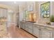 Kitchen area featuring stainless steel appliances, granite countertops, and a tile backsplash at 703 Sainte Rose Ln, Charlotte, NC 28226