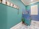 Custom pet spa with decorative blue tile and wash station at 703 Sainte Rose Ln, Charlotte, NC 28226