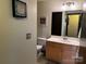 Bathroom with single sink vanity and toilet at 715 N Church St # 613, Charlotte, NC 28202