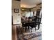 Inviting dining area with hardwood floors, a stylish rug, and contemporary furnishings at 715 N Church St # 613, Charlotte, NC 28202