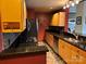 Modern kitchen with stainless steel appliances, granite countertops, and ample cabinet space at 715 N Church St # 613, Charlotte, NC 28202