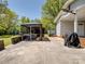 Concrete back patio featuring a beautiful gazebo surrounded by brick walls for outdoor relaxation at 7617 Pleasant Hill Church Rd, Marshville, NC 28103