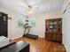 Guest bedroom with hardwood floors and natural lighting at 7617 Pleasant Hill Church Rd, Marshville, NC 28103