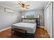 Neutral bedroom with hardwood floors, a bed and a window at 7617 Pleasant Hill Church Rd, Marshville, NC 28103